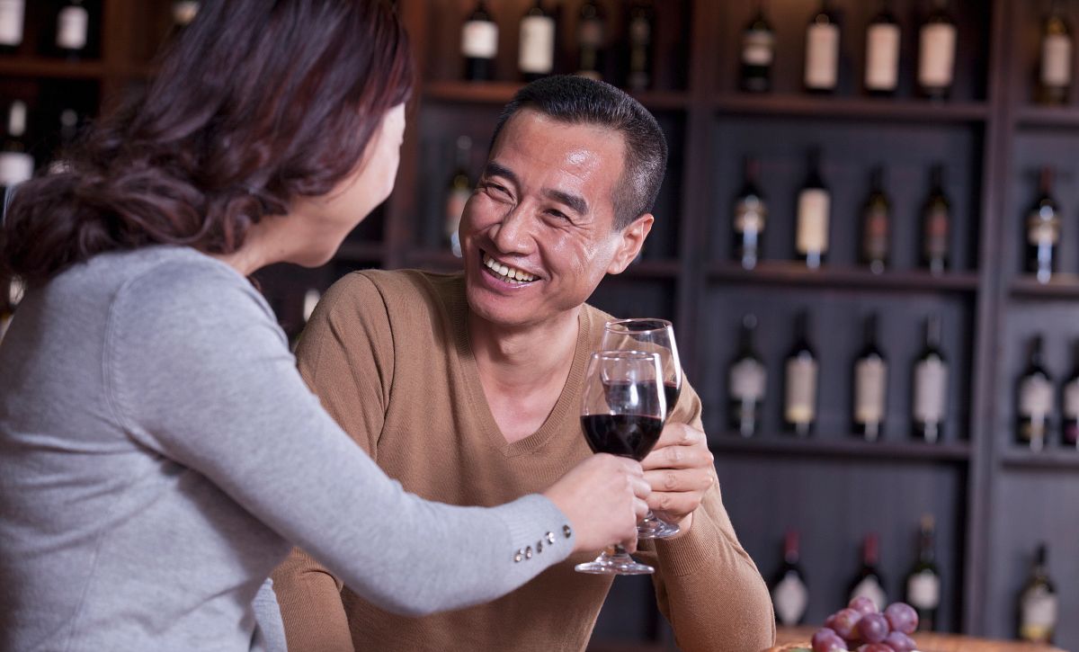 Man & Women Drinking Wine