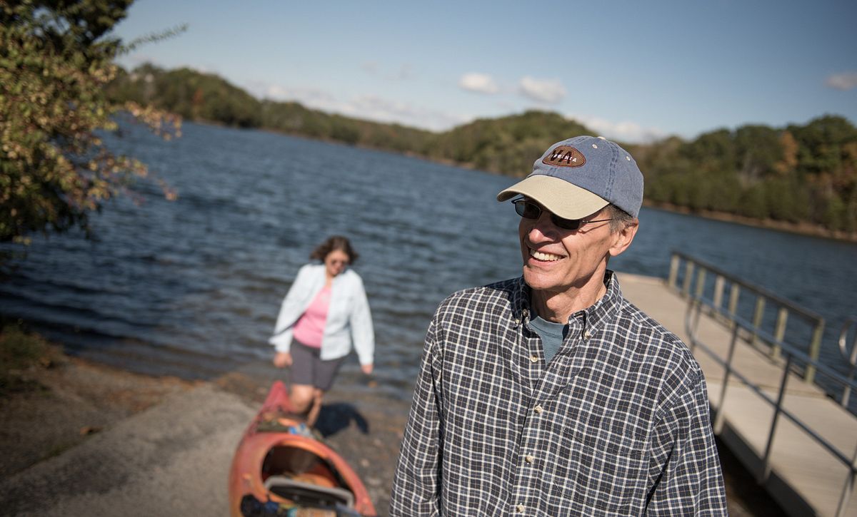 Couple Launching Boat from Lake Frederick