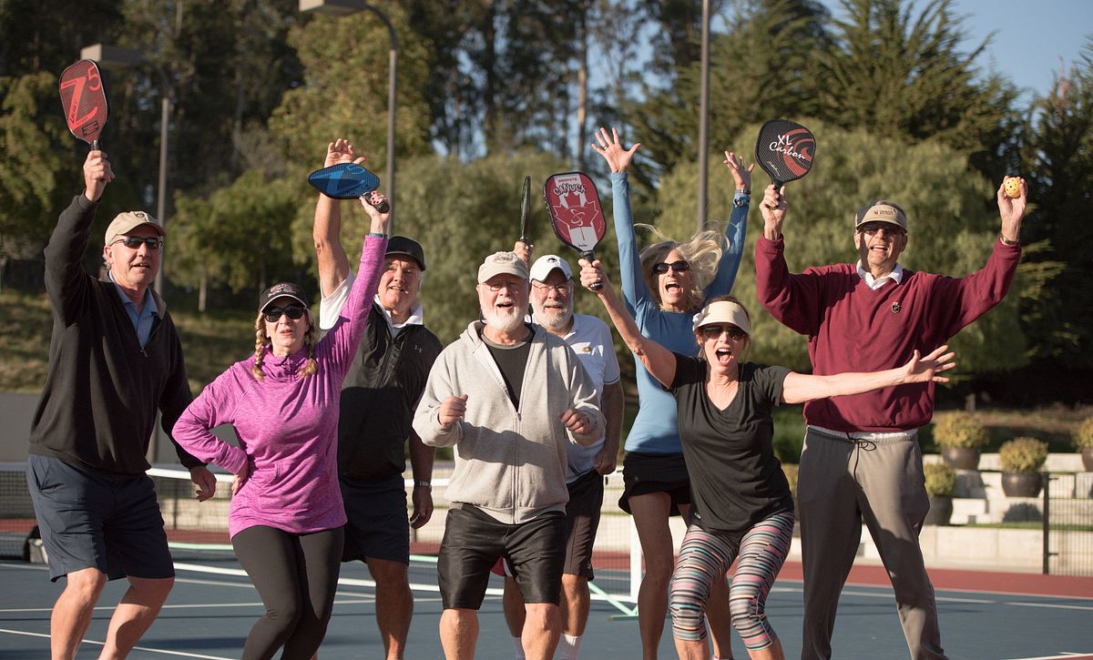 Group of pickleballers on the courts