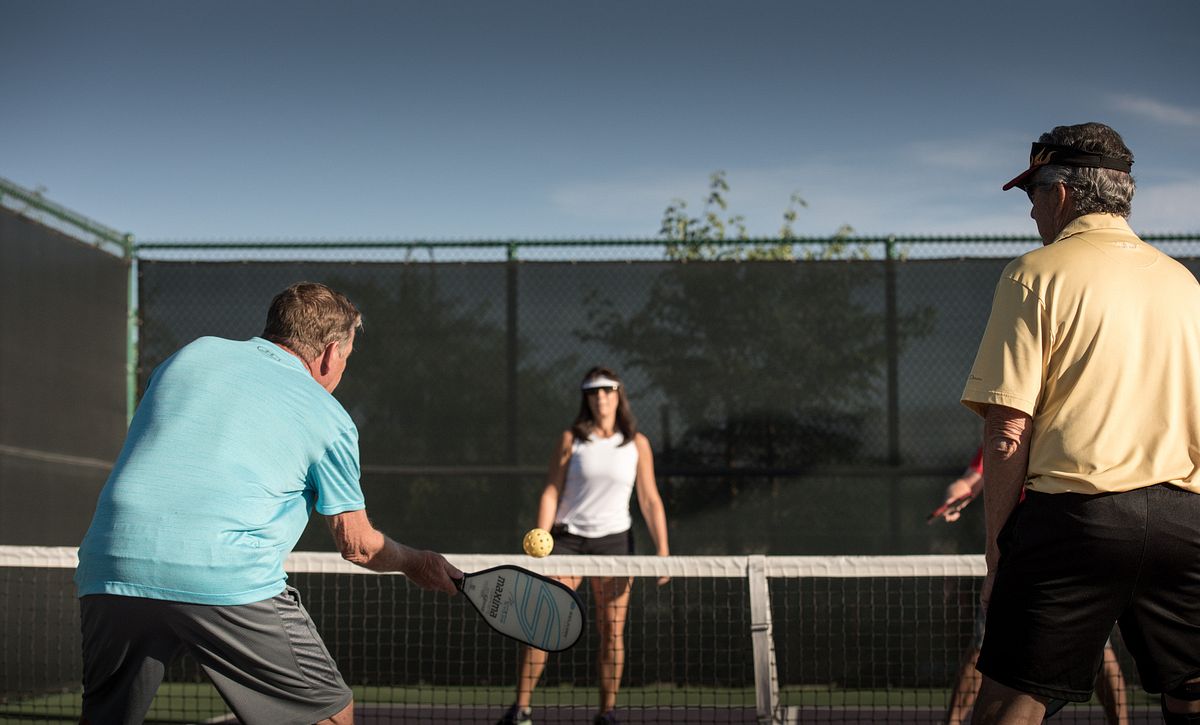 Trilogy Homeowners Playing Pickleball