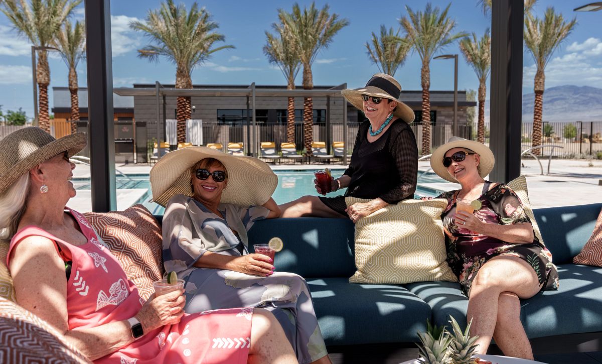 Women Lounging by the Pool