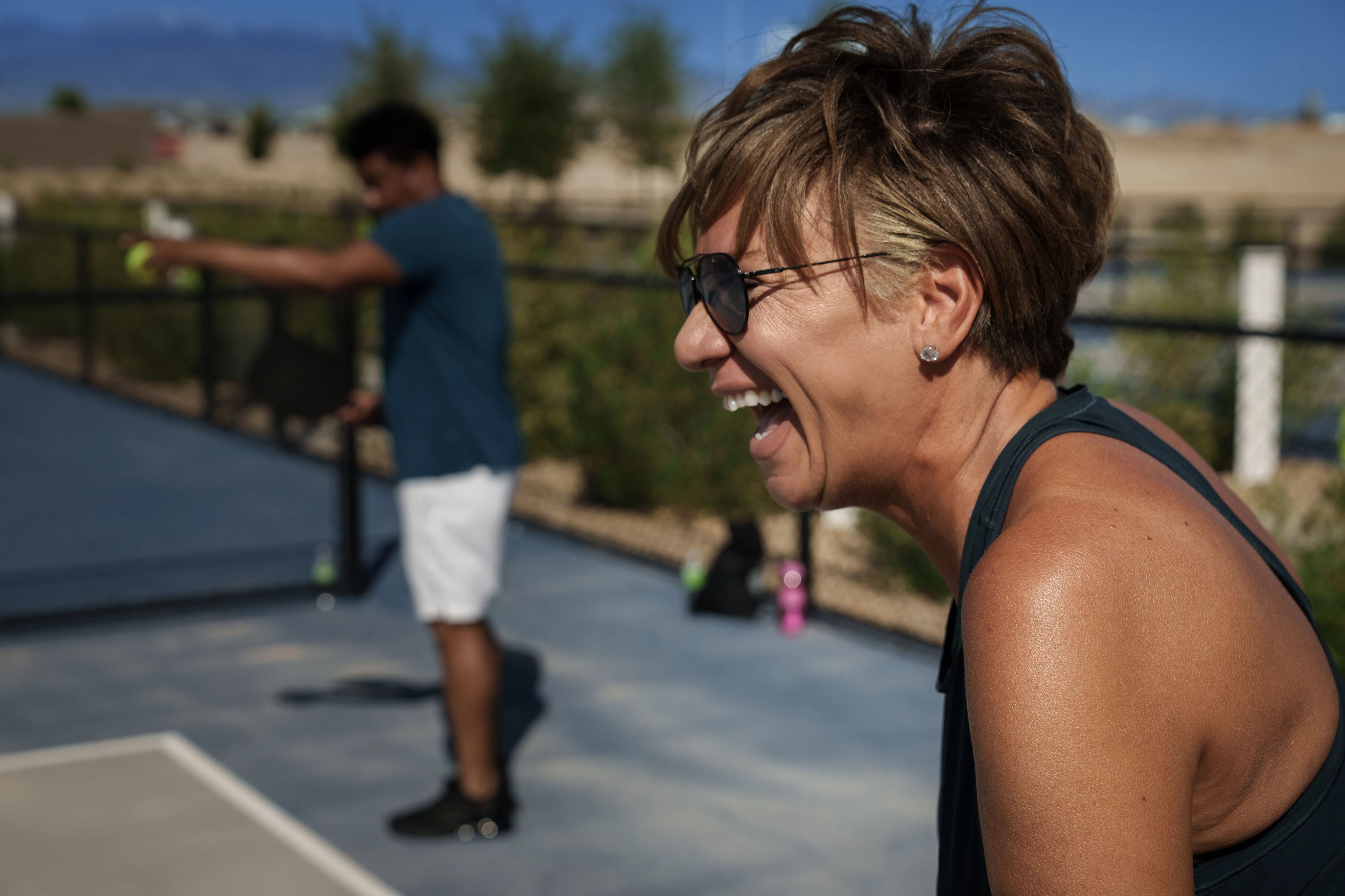 Trilogy Sunstone Homeowner Playing Pickle Ball